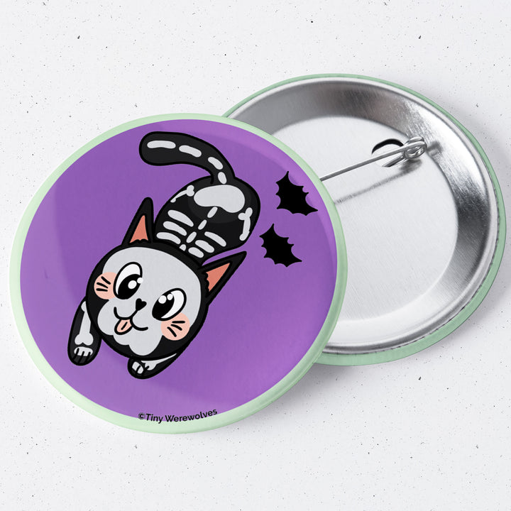 Based in Chicago by queer artist & designer Kayla Pekkala - Tiny Werewolves | SkeliCat Spooky 1.75" Button Pin in | Shop to get your Metal Pinback Button with collections featuring retro-inspired designs infused with social commentary art, highlighting modern social & current events.