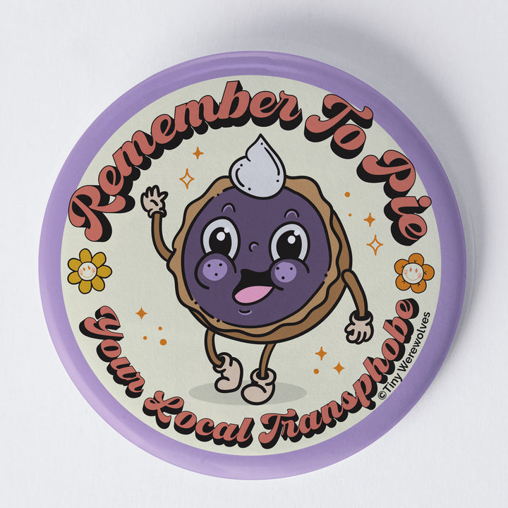 Based in Chicago by queer artist & designer Kayla Pekkala - Tiny Werewolves | Pie Your Local Transphobe 1.75" Button Pin in | Shop to get your Metal Pinback Button with collections featuring retro-inspired designs infused with social commentary art, highlighting modern social & current events.