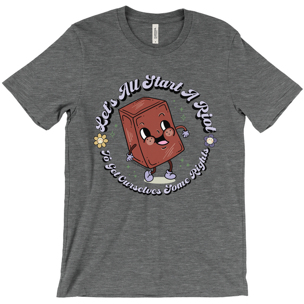 Based in Chicago by queer artist & designer Kayla Pekkala - Tiny Werewolves | Let's All Start A Riot Tee in Deep Heather | Shop to get your Tee with collections featuring retro-inspired designs infused with social commentary art, highlighting modern social & current events.