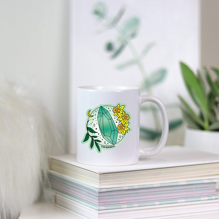 Based in Chicago by queer artist & designer Kayla Pekkala - Tiny Werewolves | March Crystal & Flower Birthstone Mug in | Shop to get your Mug with collections featuring retro-inspired designs infused with social commentary art, highlighting modern social & current events.
