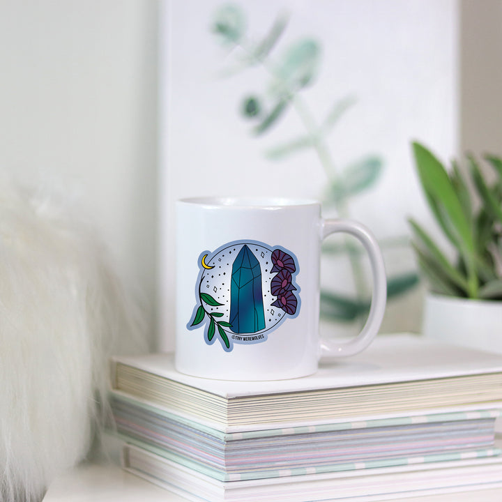 Based in Chicago by queer artist & designer Kayla Pekkala - Tiny Werewolves | September Crystal & Flower Birthstone Mug in | Shop to get your Mug with collections featuring retro-inspired designs infused with social commentary art, highlighting modern social & current events.