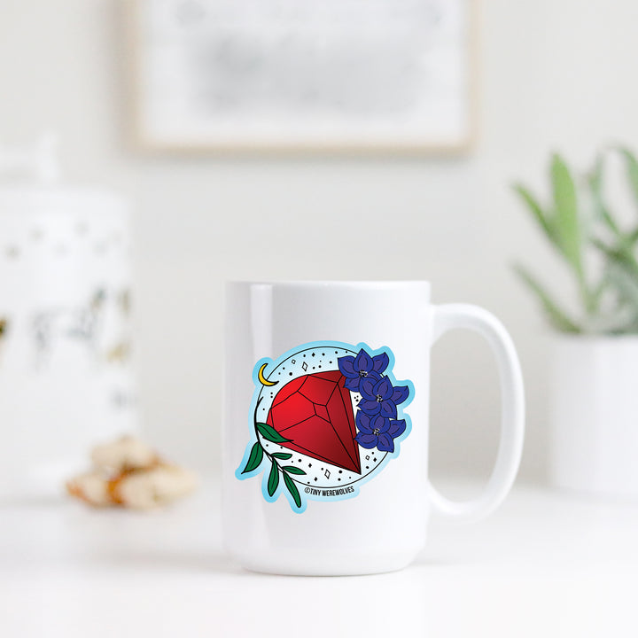 Based in Chicago by queer artist & designer Kayla Pekkala - Tiny Werewolves | July Crystal & Flower Birthstone Mug in | Shop to get your Mug with collections featuring retro-inspired designs infused with social commentary art, highlighting modern social & current events.