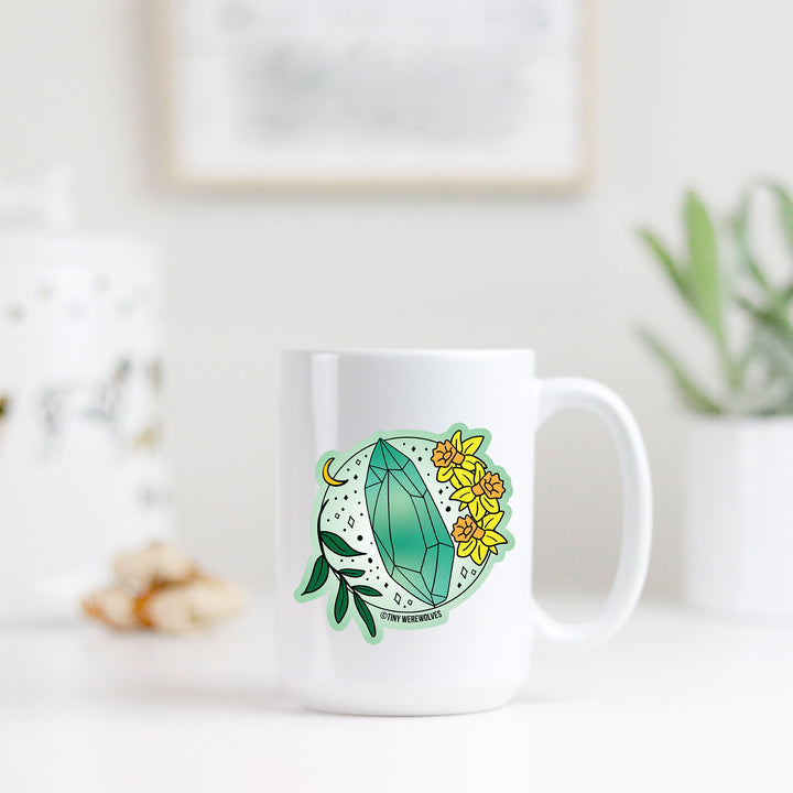 Based in Chicago by queer artist & designer Kayla Pekkala - Tiny Werewolves | March Crystal & Flower Birthstone Mug in | Shop to get your Mug with collections featuring retro-inspired designs infused with social commentary art, highlighting modern social & current events.