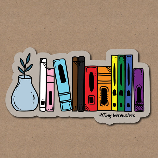 Based in Chicago by queer artist & designer Kayla Pekkala - Tiny Werewolves | Progressive Rainbow Bookshelf Pride Sticker in 5" Sticker | Shop to get your Sticker with collections featuring retro-inspired designs infused with social commentary art, highlighting modern social & current events.