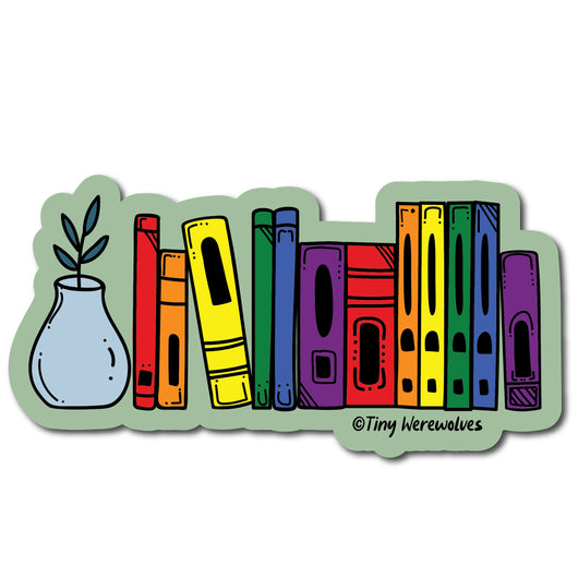 Based in Chicago by queer artist & designer Kayla Pekkala - Tiny Werewolves | Rainbow Bookshelf Pride Sticker in | Shop to get your Sticker with collections featuring retro-inspired designs infused with social commentary art, highlighting modern social & current events.