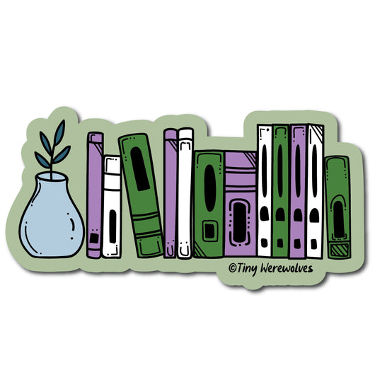Based in Chicago by queer artist & designer Kayla Pekkala - Tiny Werewolves | Gender Queer Bookshelf Pride Sticker in | Shop to get your Sticker with collections featuring retro-inspired designs infused with social commentary art, highlighting modern social & current events.